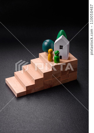 A small wooden house as an idea for investing in your own home A small wooden house as an idea for investing in your own home 110058487