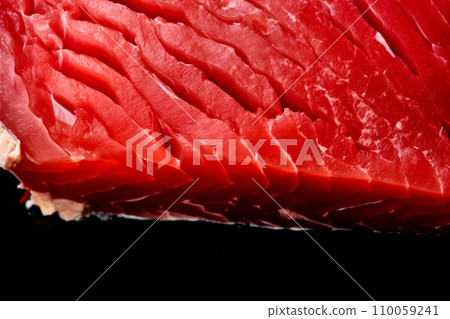 Fresh tuna fish fillet steaks isolated on black background. Raw seafood Fresh tuna fish fillet steaks isolated on black background. Raw seafood 110059241