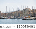 A multitude of masts of parked boats in the marina of Marseille. 110059491