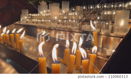 Candles are lit in the Catholic Church. Candles are lit in the Catholic Church. 110060313