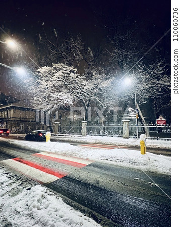 Snowfall in the city at night. Heavy snowfall in the city. 110060736