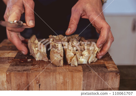 Preparing an empanada 110061707