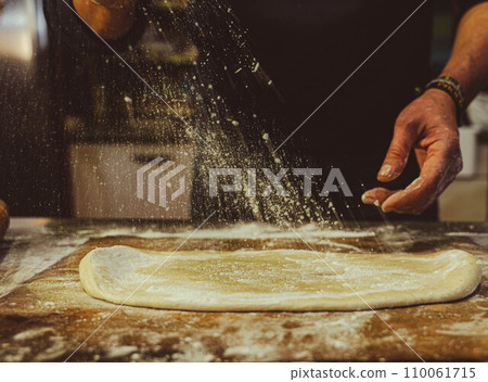 Preparing an empanada Preparing an empanada 110061715
