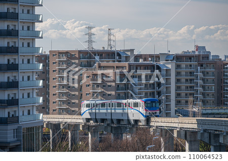 Monorail running through a residential complex Osaka Monorail Saito Line 110064523