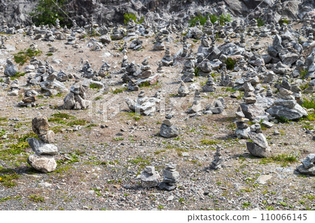 A lot of stone cairns standing at former marble quarry of Ruskeala, Republic of Karelia A lot of stone cairns standing at former marble quarry of Ruskeala, Republic of Karelia 110066145