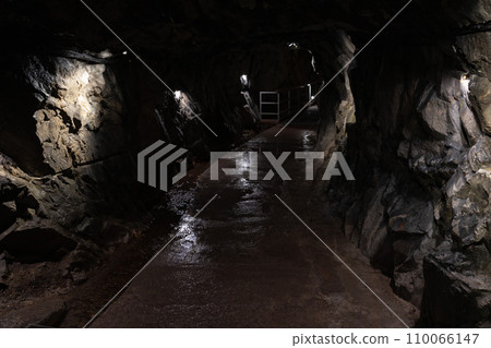 Dark tunnel of a marble quarry of Ruskeala, Republic of Karelia Dark tunnel of a marble quarry of Ruskeala, Republic of Karelia 110066147