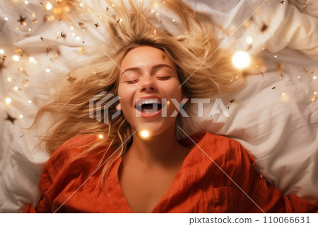 Young blonde woman having orgasm. Beautiful woman with open mouth and closed eyes enjoying sex lying among fireworks. Sparklers as a symbol of orgasm. Sexual experience, masturbation, cunnilingus. Young blonde woman having orgasm. Beautiful woman with open mouth and closed eyes enjoying sex lying among fireworks. Sparklers as a symbol of orgasm. Sexual experience, masturbation, cunnilingus. 110066631