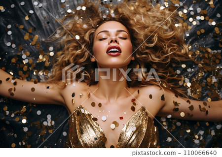 Young European woman having orgasm. Beautiful woman with open mouth and closed eyes enjoying sex lying among fireworks. Sparklers as a symbol of orgasm. Sexual experience, masturbation, cunnilingus. 110066640