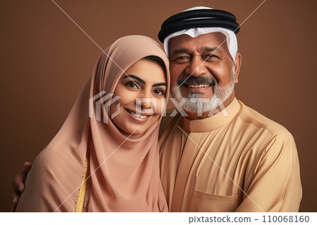 AI-generated content. A cinematic portrait of a modern saudi couple smiling to camera during ramadan Generative AI 110068160