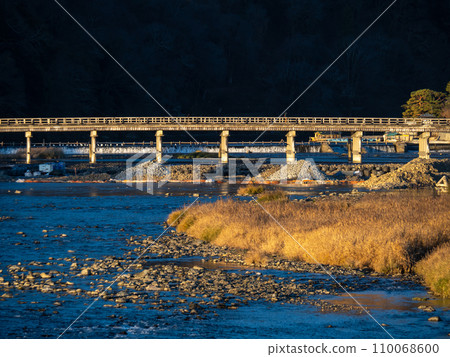 Early morning scenery of Arashiyama (Kyoto City). Togetsukyo Bridge and Katsura River. 110068600