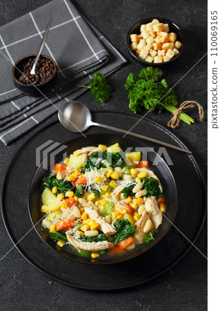 Chicken and white bean soup with veggies, corn Chicken and white bean soup with veggies, corn 110069165