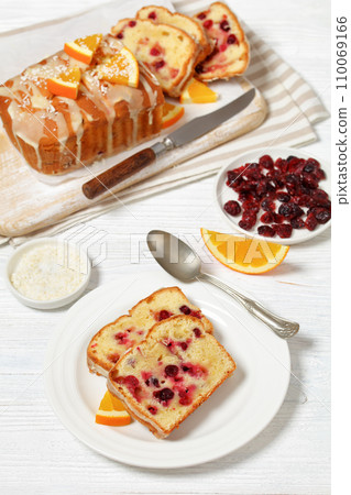 orange cranberry loaf with orange glaze, top view orange cranberry loaf with orange glaze, top view 110069166