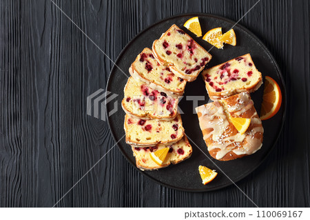 orange cranberry loaf with orange glaze, top view orange cranberry loaf with orange glaze, top view 110069167
