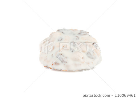 One cookie with nuts covered with white chocolate glaze on a white background. One cookie with nuts covered with white chocolate glaze on a white background. 110069461