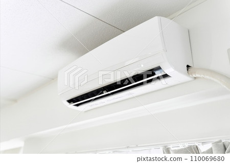 Air conditioner running indoors 110069680