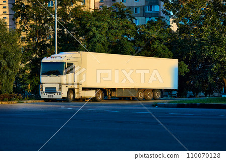 Long distance truck for transporting goods in the parking lot Long distance truck for transporting goods in the parking lot 110070128
