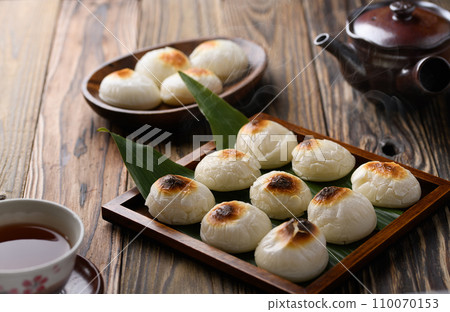 Freshly baked round mochi Freshly baked round mochi 110070153