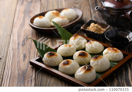 Freshly baked round mochi Freshly baked round mochi 110070155