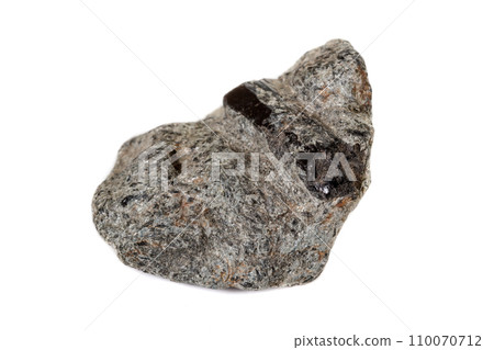 macro mineral stone schorl, black tourmaline on white background macro mineral stone schorl, black tourmaline on white background 110070712