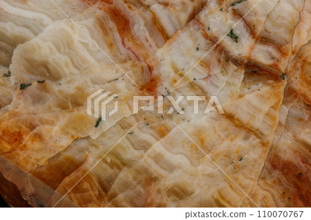 Macro stone agate mineral on a black background Macro stone agate mineral on a black background 110070767