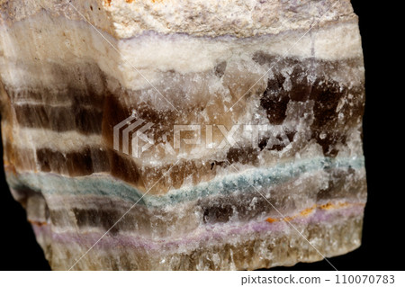 Macro stone mineral Fluorite on a black background Macro stone mineral Fluorite on a black background 110070783