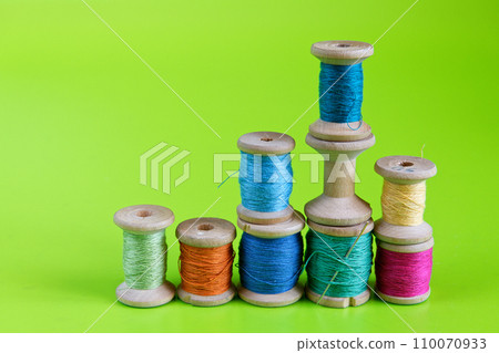 Old wooden reels of thread 110070933