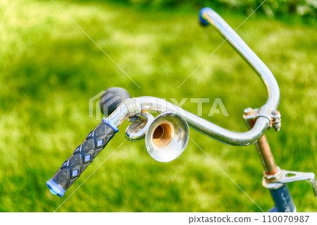 Vintage bicycle horn on handlebar Vintage bicycle horn on handlebar 110070987