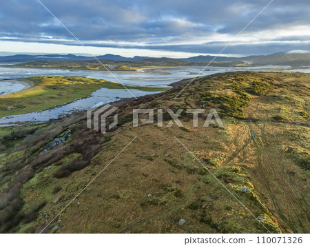 Aerial view of Castlegoland hill by Portnoo - County Donegal, Ireland. Aerial view of Castlegoland hill by Portnoo - County Donegal, Ireland. 110071326