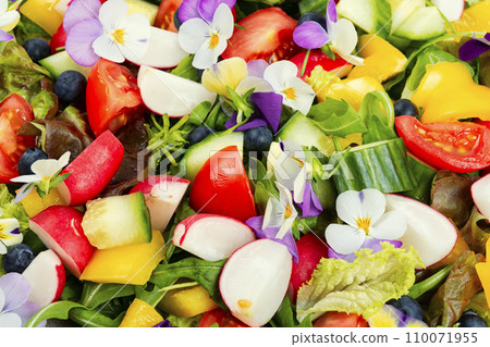 Spring salad with vegetables and flowers. 110071955