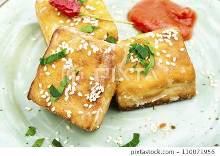 Fried soy cheese tofu, vegan food. Fried soy cheese tofu, vegan food. 110071956