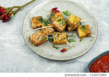 Skewer with tasty tofu cheese Skewer with tasty tofu cheese 110071960
