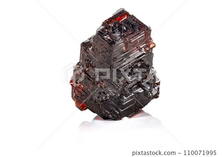 Macro stone Garnet mineral in rock on a white background Macro stone Garnet mineral in rock on a white background 110071995