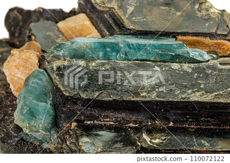 Macro aquamarine mineral stone in rock on white background Macro aquamarine mineral stone in rock on white background 110072122