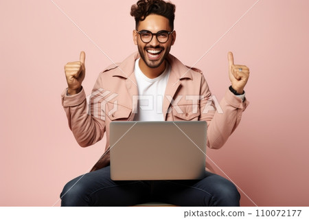 AI-generated content. A Happy Young Promising Businessman Who Uses Laptop on the Pink Background 110072177