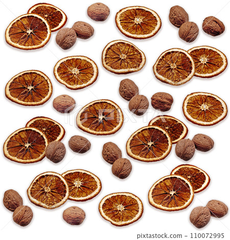 Background of walnuts and dried citrus slices. Backdrop for design 110072995