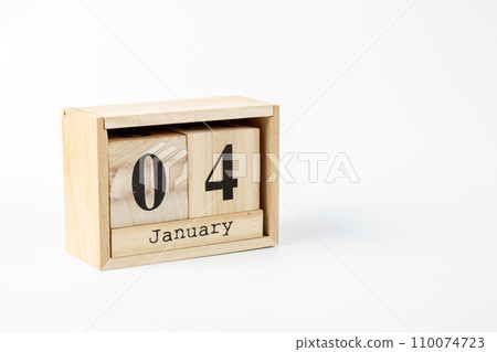Wooden calendar January 04 on a white background Wooden calendar January 04 on a white background 110074723