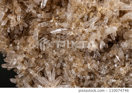 Macro mineral quartz stone with Limonite and Lepidolite black background Macro mineral quartz stone with Limonite and Lepidolite black background 110074746