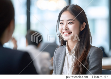 “AI-generated image” of a smiling woman working seriously 110074916