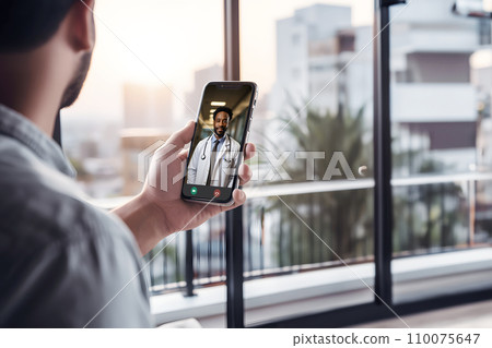 A man talks with his doctor via video call A man talks with his doctor via video call 110075647