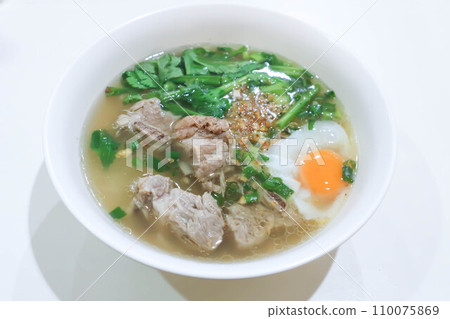 pork soup or pork rib soup with egg and vegetable or boiled rice with pork or boiled rice soup and egg pork soup or pork rib soup with egg and vegetable or boiled rice with pork or boiled rice soup and egg 110075869