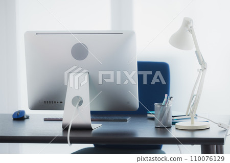 Office with a personal computer 110076129