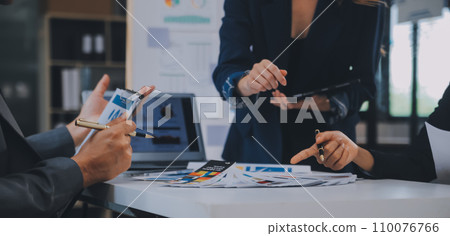 Close up ux developer and ui designer use augmented reality brainstorming about mobile app interface wireframe design on desk at modern office.Creative digital development agency Close up ux developer and ui designer use augmented reality brainstorming about mobile app interface wireframe design on desk at modern office.Creative digital development agency 110076766