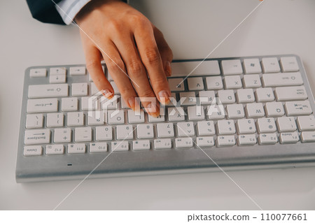 Communication support, call center and customer service help desk. VOIP headset on telephone keyboard. Communication support, call center and customer service help desk. VOIP headset on telephone keyboard. 110077661