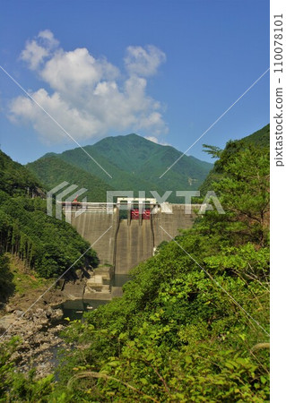 Miyagawa Dam embankment and blue sky Miyagawa Dam embankment and blue sky 110078101