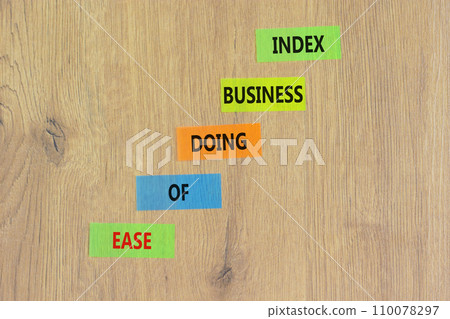 Ease of doing business index symbol. Concept words Ease of doing business index on colored paper. Beautiful wooden background. Business, ease of doing business index concept. Copy space. Ease of doing business index symbol. Concept words Ease of doing business index on colored paper. Beautiful wooden background. Business, ease of doing business index concept. Copy space. 110078297