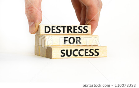 Destress for success symbol. Concept words Destress for success on wooden blocks. Doctor hand. Beautiful white background. Psychological business and destress for success concept. Copy space. 110078358