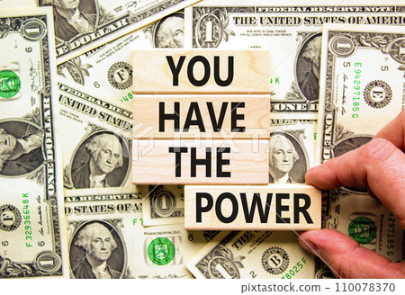 You have the power symbol. Concept word You have the power on beautiful wooden block. Dollar bills. Beautiful background from dollar bills. Business motivational you have the power concept. Copy space 110078370
