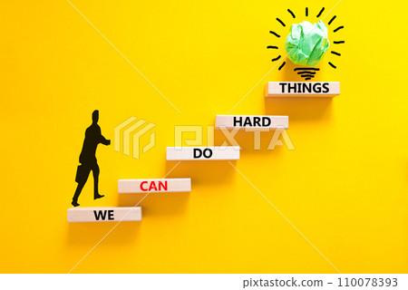 We can do hard things symbol. Concept words We can do hard things on wooden blocks. Beautiful yellow table yellow background. Businessman icon. Business, we can do hard things concept. Copy space. We can do hard things symbol. Concept words We can do hard things on wooden blocks. Beautiful yellow table yellow background. Businessman icon. Business, we can do hard things concept. Copy space. 110078393