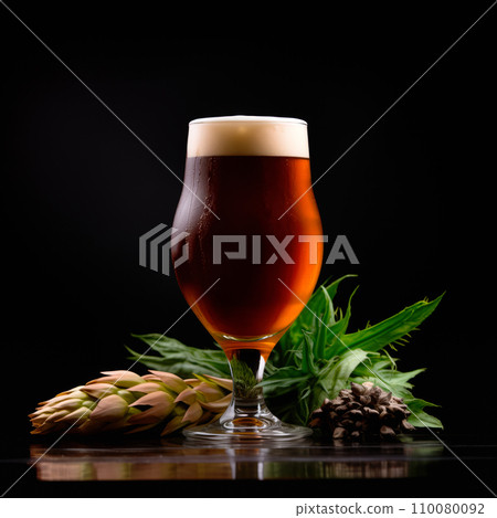 Beer in a tall glass on a dark black background. Mugs with drink like Ipa, Pale Ale, Pilsner, Porter or Stout 110080092