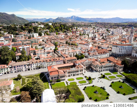 VARESE, ITALY - MAY 12, 2023: woman next to the Lebanon Cedar tree in the Esten 110081486